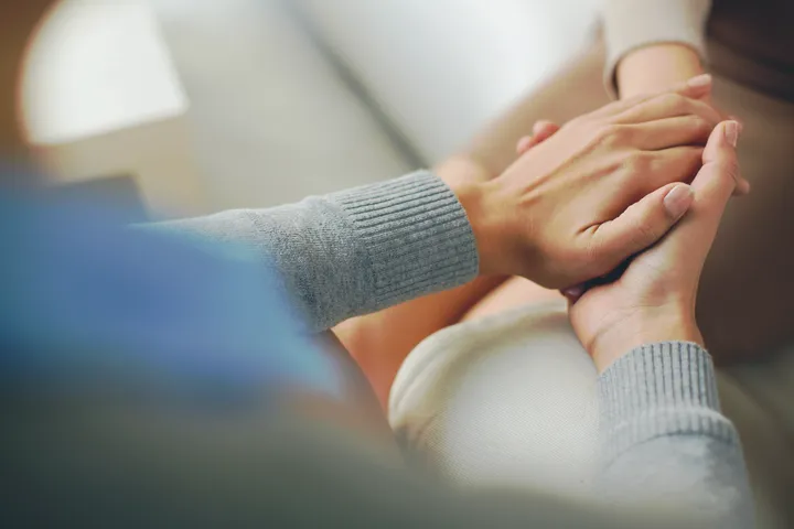 Supportive hands during a quiet meeting, wrongful death counsel in New York